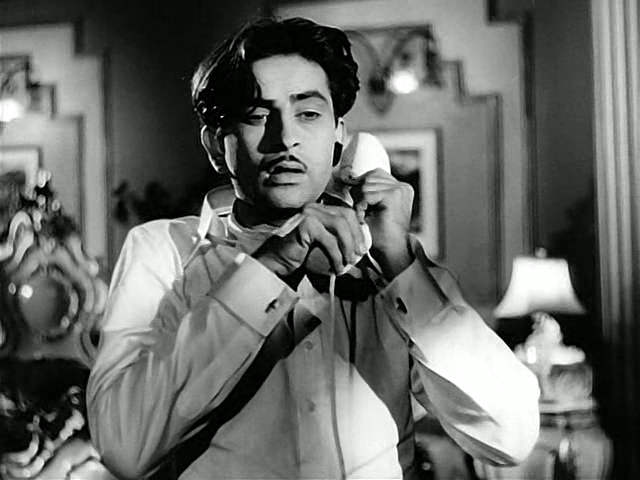 Raj Kapoor Holding Phone