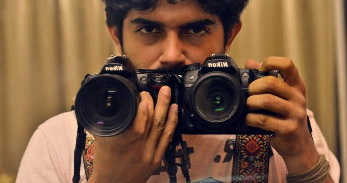 Raj Singh Holding Camera