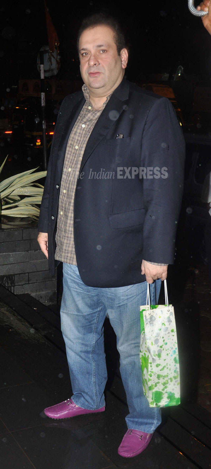 Rajiv Kapoor Holding Bag