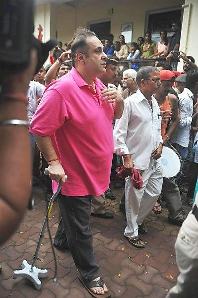 Rajiv Kapoor Holding Stick
