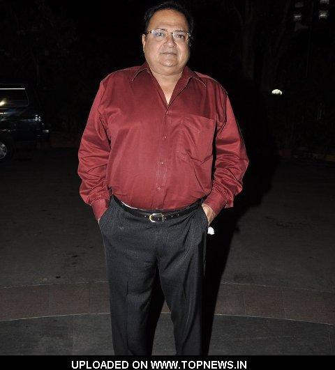 Rakesh Bedi In Red Shirt