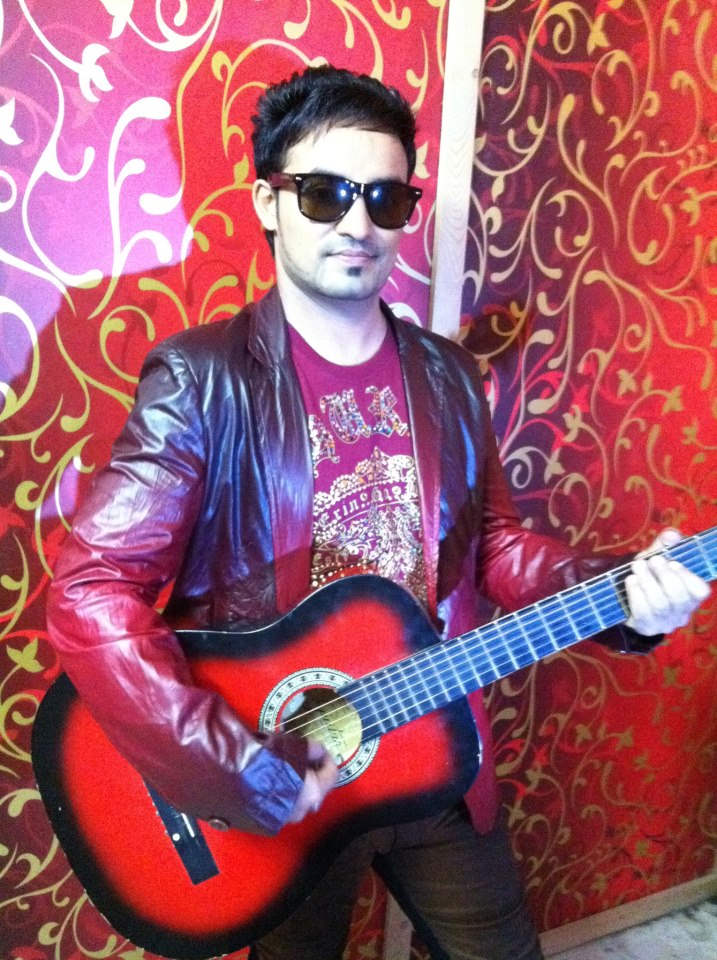 Resham Singh Anmol Playing Guitar