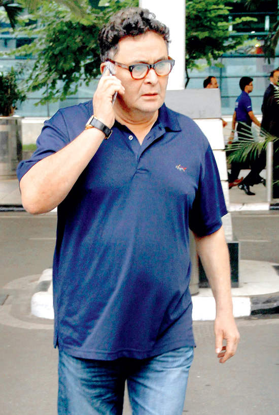 Rishi Kapoor Holding Phone