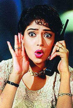 Ruby Bhatia Holding Phone