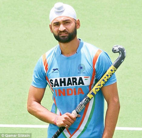 Player Sandeep Singh Holding Hockey Stick