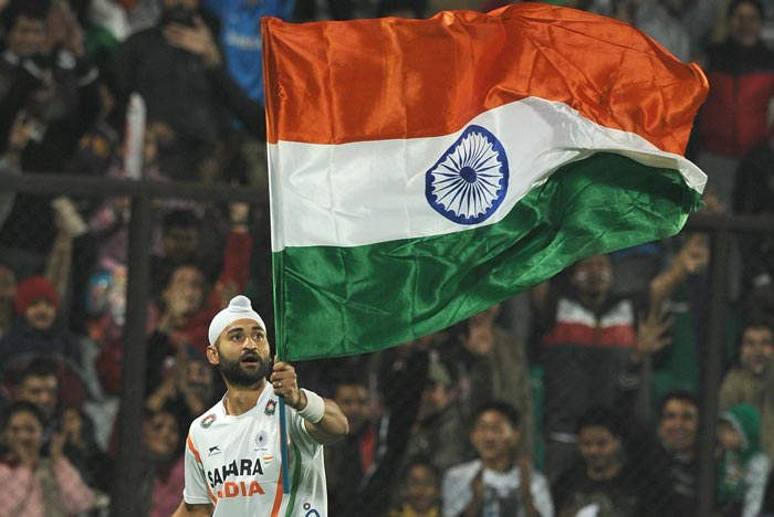 Sandeep Singh Holding Flag