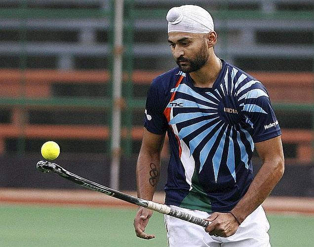 Sandeep Singh Holding Hockey Stick