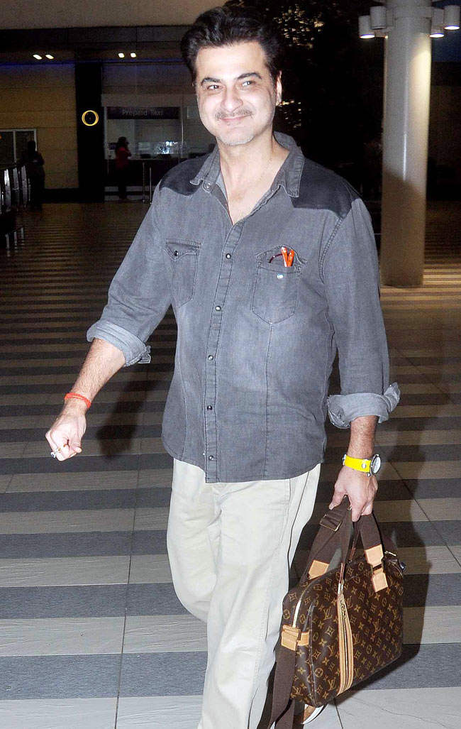 Actor Sanjay Kapoor Holding Bag