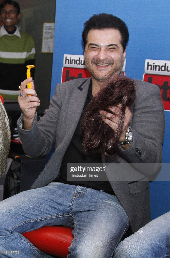 Sanjay Kapoor Holding Hair