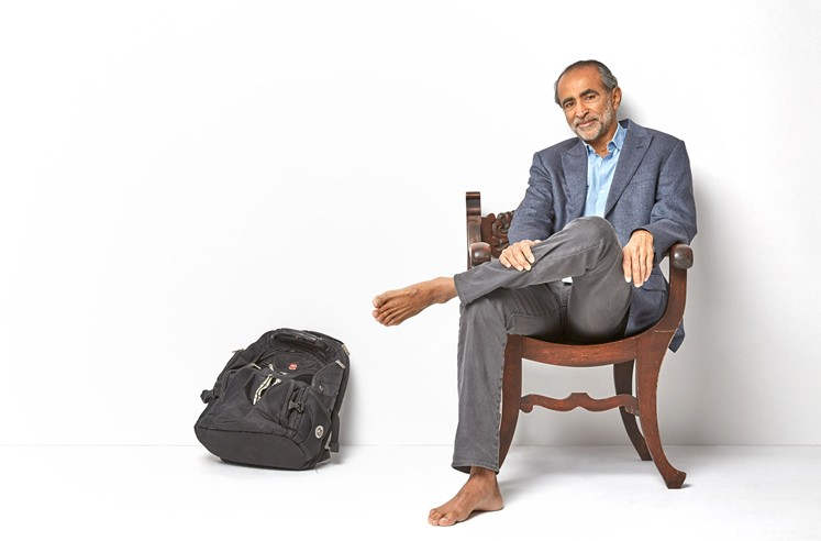 Sanjiv Sidhu Sitting On Chair