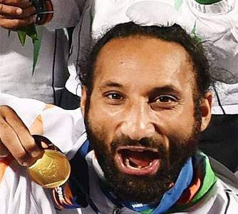 Sardara Singh Holding Medal