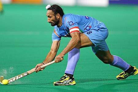 Sardara Singh Holding Stick