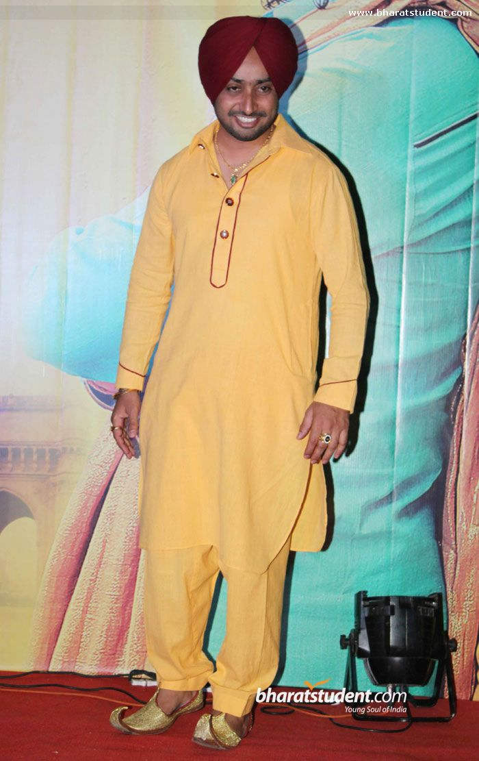 Satinder Sartaaj Wearing Yellow Kurta Pjama