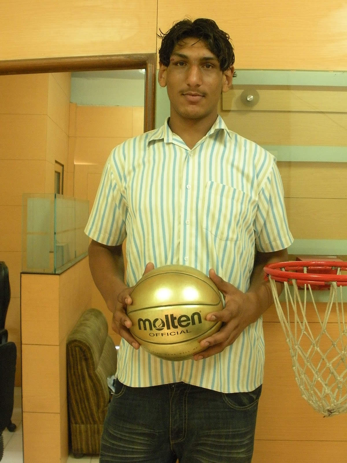 Satnam Singh Bhamara Holding Basketball