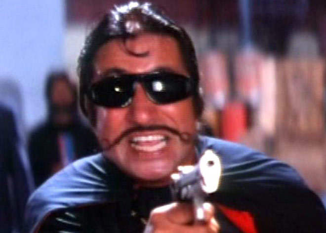 Shakti Kapoor Holding Gun