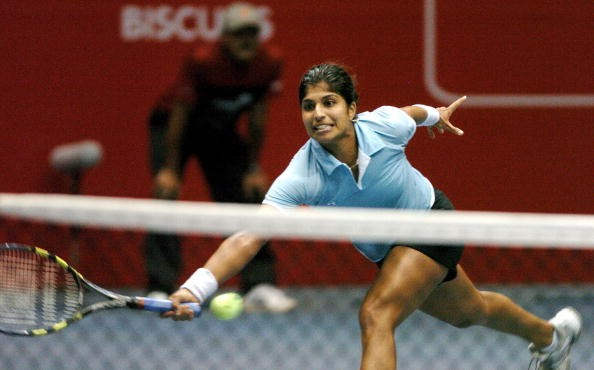 Shikha Hitting Tennis Ball
