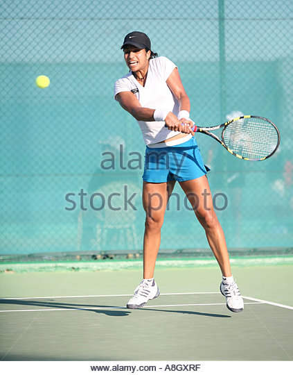 Shikha Playing Tennis
