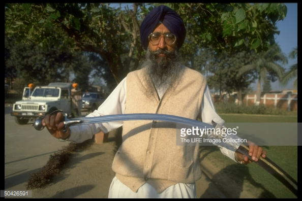 Simranjit Singh Mann Holding Sword