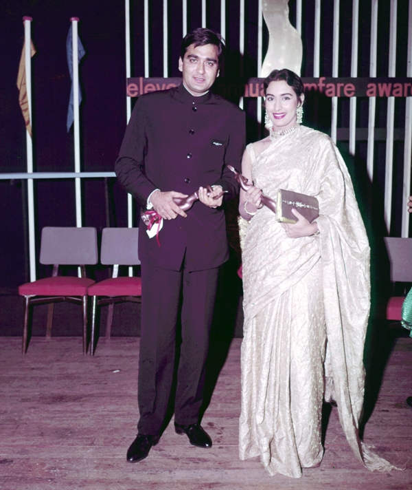 Sunil And Nargis With Their Trophies