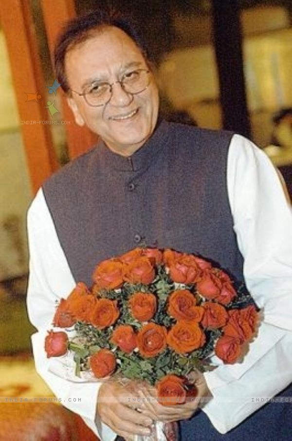 Sunil Dutt Holding Flower Bouquet