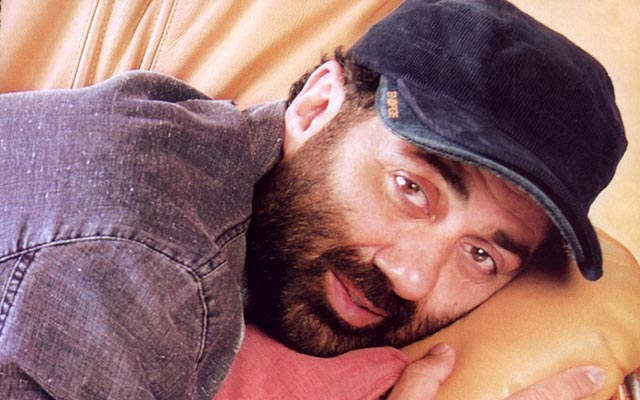 Sunny Deol Laying On Bed