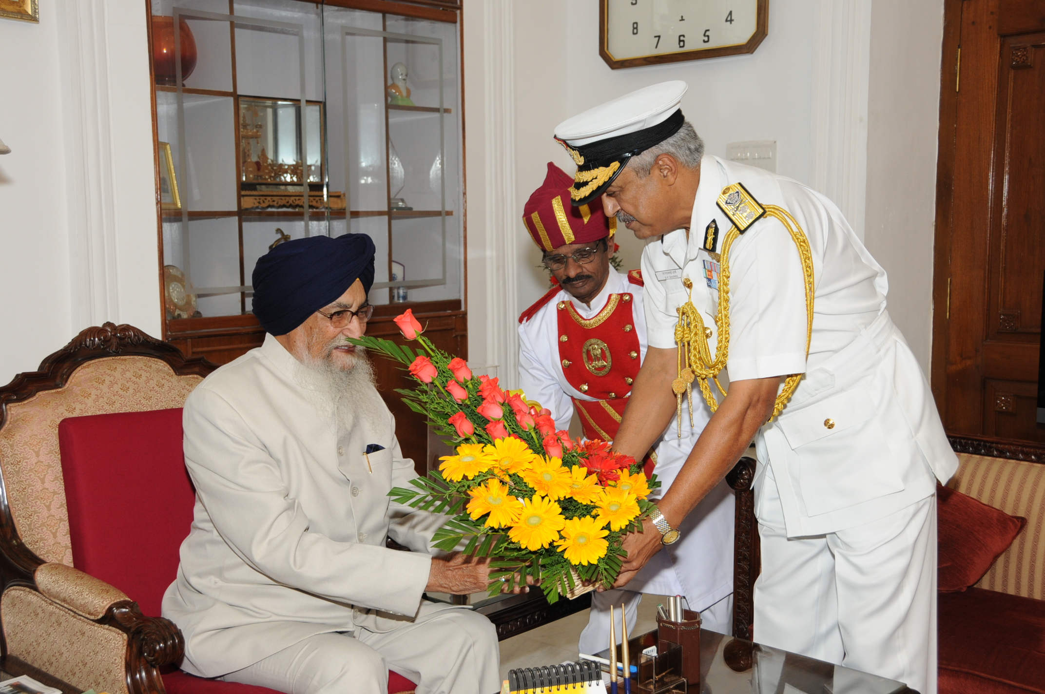 Indian Navy Officer Giving Bouquet To Surjit Singh Barnala