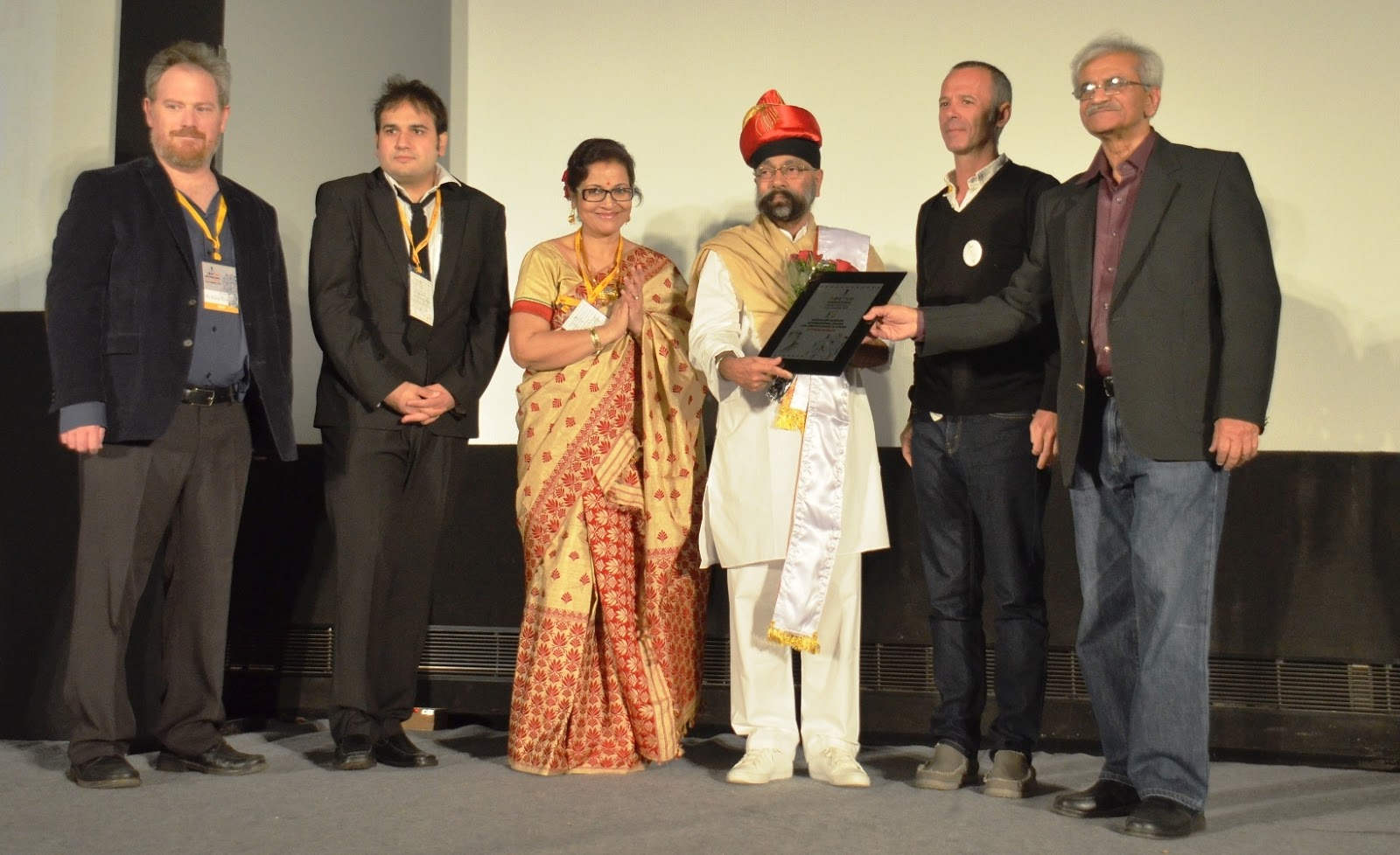 Uttam Singh Receiving Award