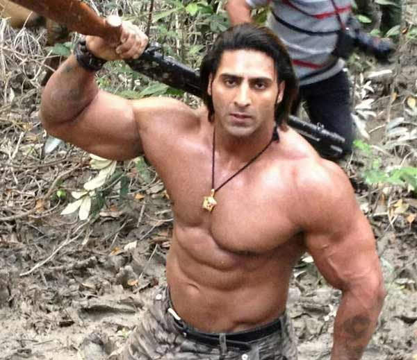 Varinder Singh Holding Gun