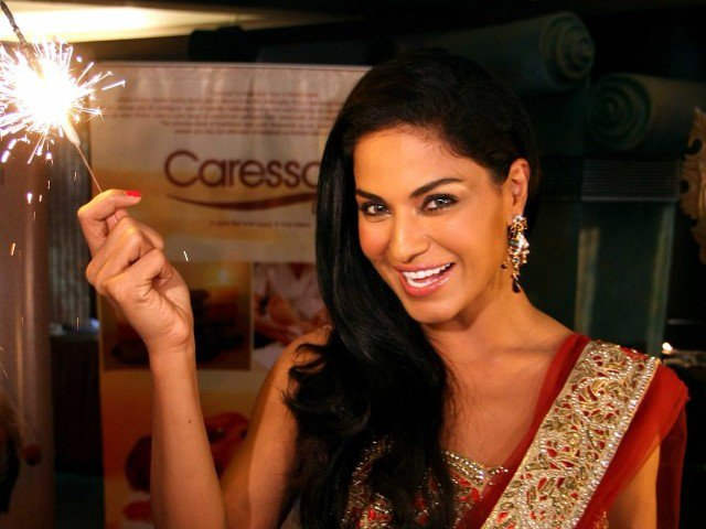 Veena Malik Holding Cracker