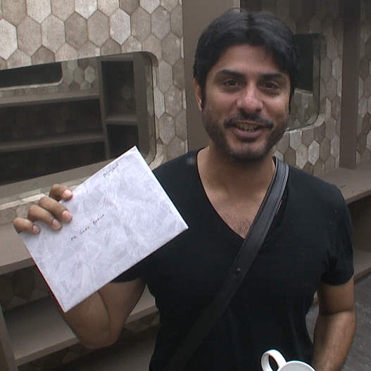 Vikas Bhalla Showing His Greeting Card