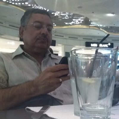 Vinod Dua Holding His Phone