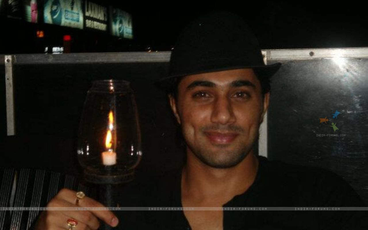 Vishal Karwal Holding Candle Glass