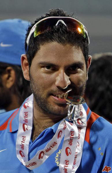 Yuvraj Singh Holding His Medal With Mouth