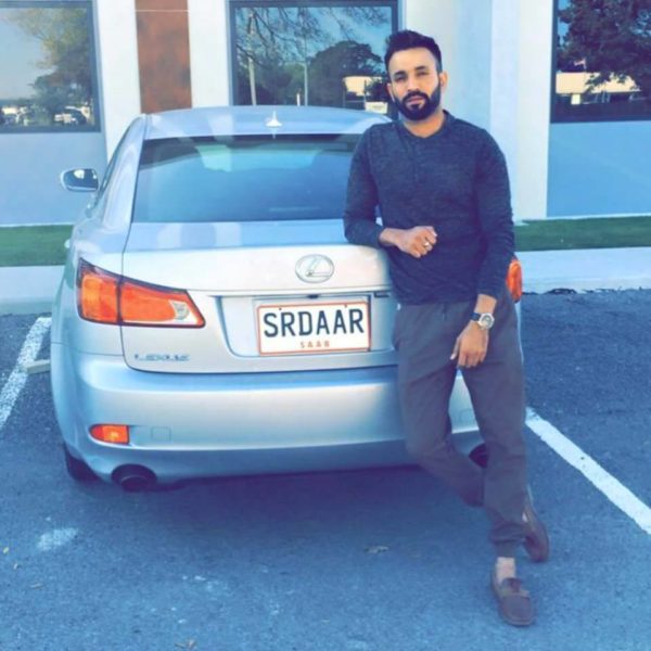 Dilpreet Dhillon Giving Pose With Car
