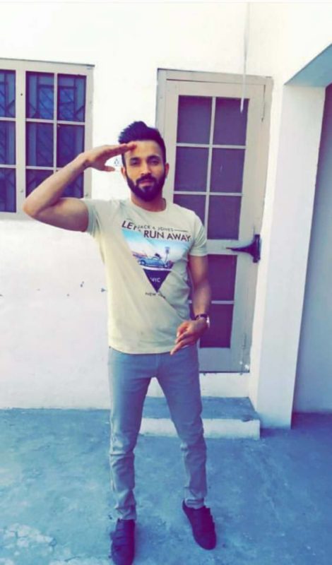 Dilpreet Dhillon Giving Salute Pose During Photoshoot