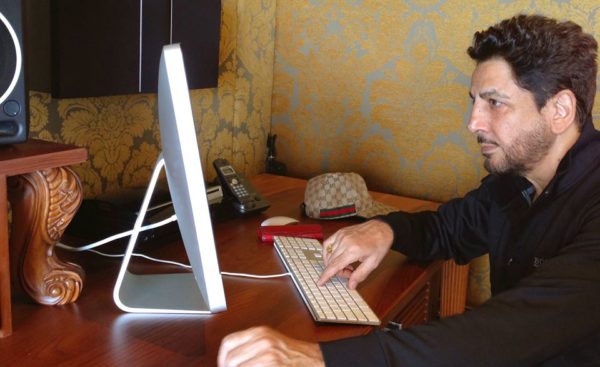 Gurdas Maan Working On Computer