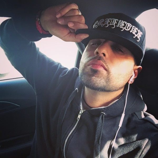 H-Dhami Giving Pose With Cap