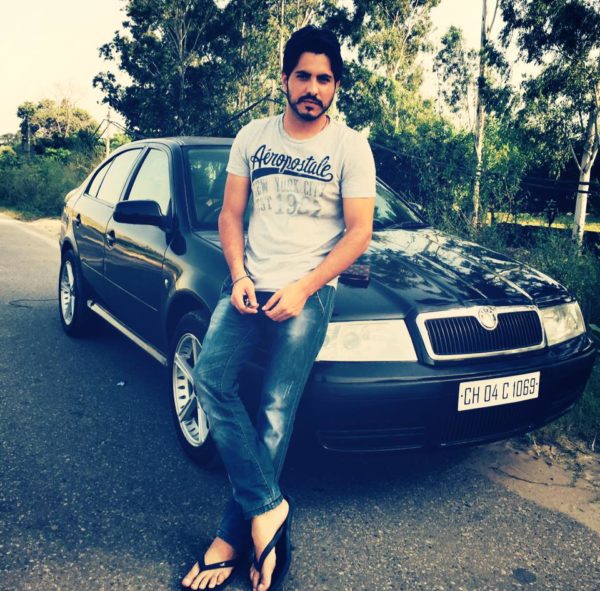 Jass Bajwa Giving Pose With Car