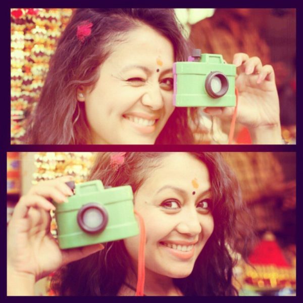 Neha Kakkar Holding Green Camera-161
