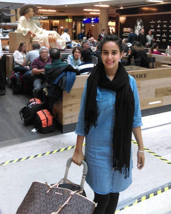 Sunanda Sharma Holding Suitcase-372