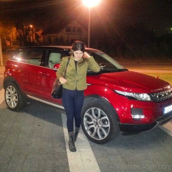Kainaat Arora Giving Pose With Red Car-0640