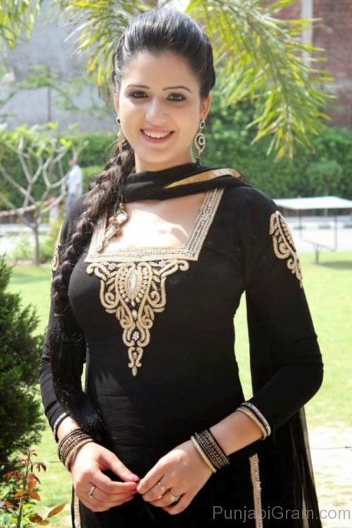 Isha Rikhi in black suit