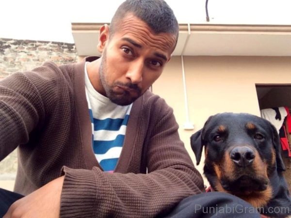 Picture Of Garry sandhu with dog 2