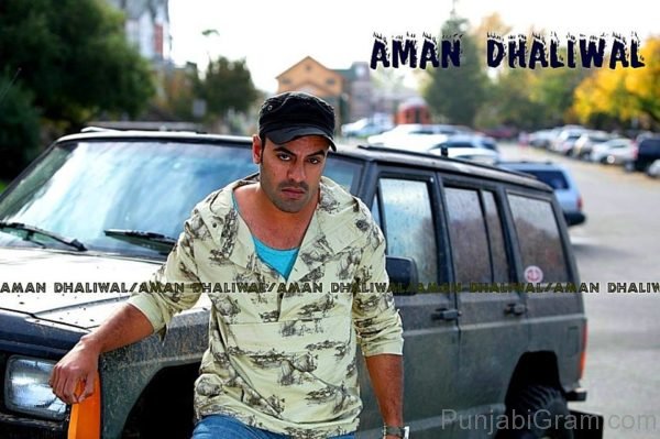 Aman Dhaliwal Giving Pose With Car