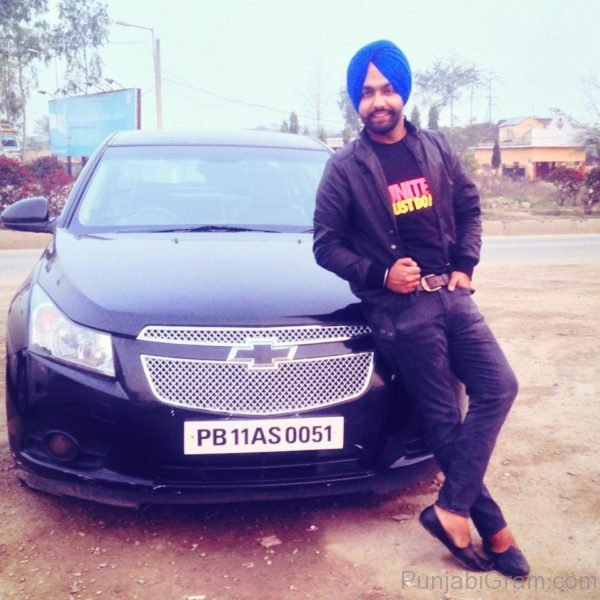 Ammy Virk Giving Pose With Car