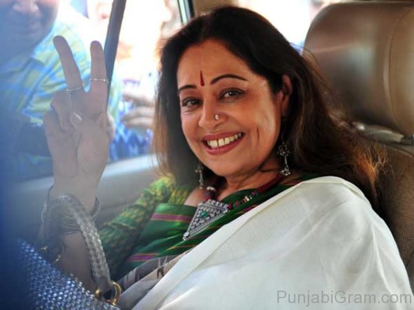 Kirron Kher Makes Victory Sign